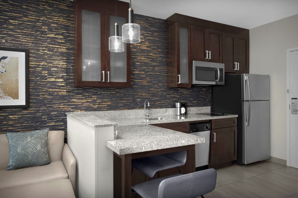 Studio, 1 King Bed with Sofa bed | Private kitchen | Fridge, microwave, stovetop, dishwasher