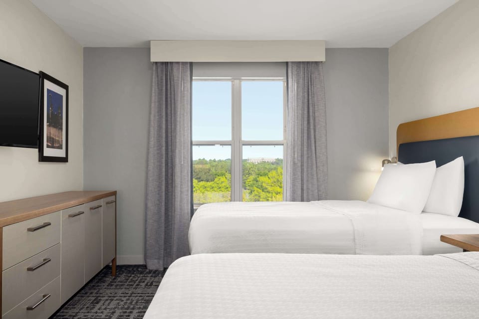 Suite, 2 Double Beds, With Balcony | Premium bedding, laptop workspace, blackout drapes, iron/ironing board
