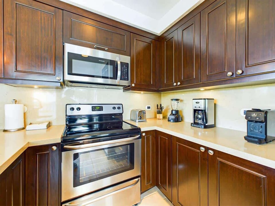 Open kitchen, stainless steel appliances