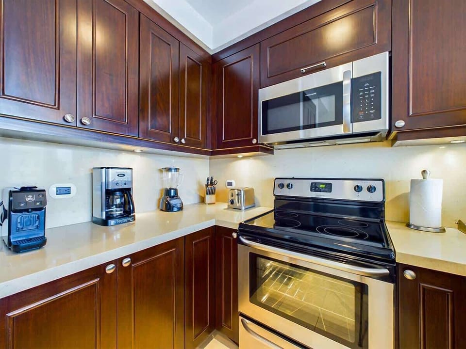 Open kitchen, stainless steel appliances