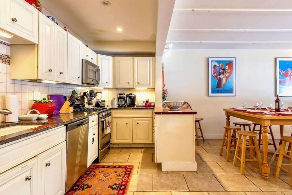 All the kitchen appliances and pots/pans/coffee makers, etc. Just bring the food