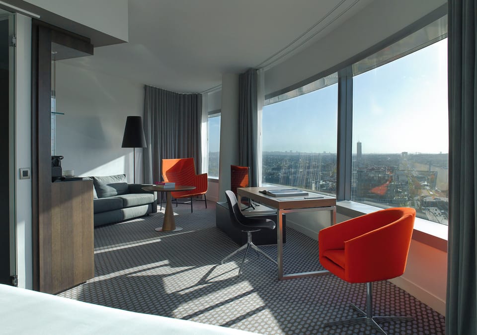 Premium bedding, desk, blackout drapes, soundproofing