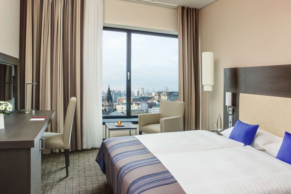 Hypo-allergenic bedding, minibar, in-room safe, desk