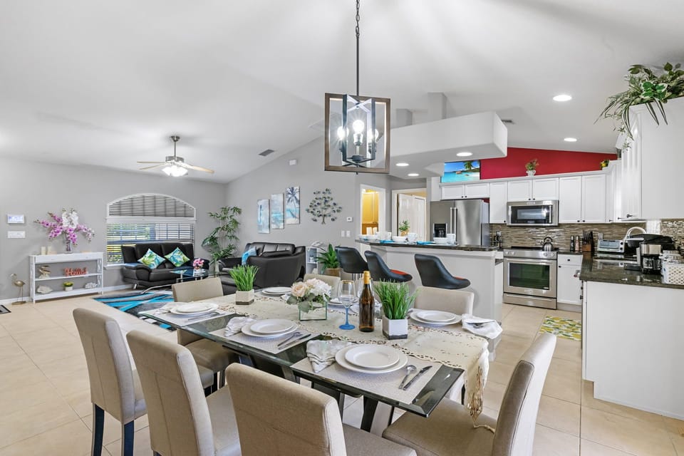 The dining room is off the kitchen & has room for 8