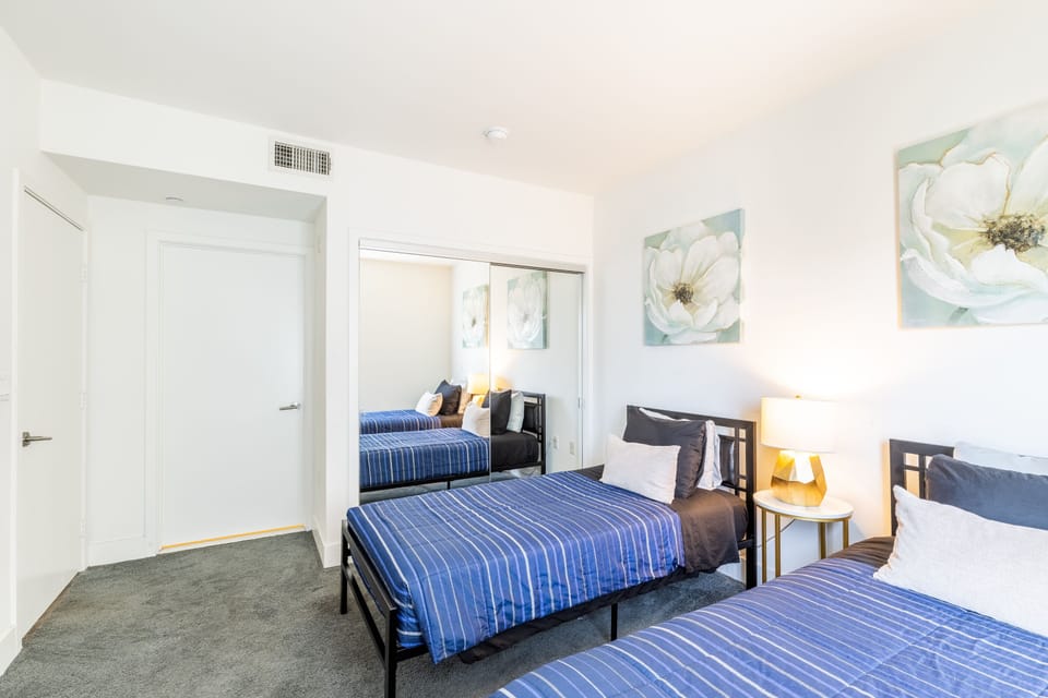 3BR Apartment on Poinsettia Pl | Frette Italian sheets, premium bedding, memory foam beds