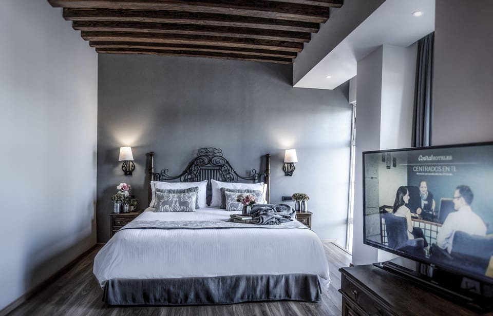 Premium bedding, down comforters, in-room safe, desk