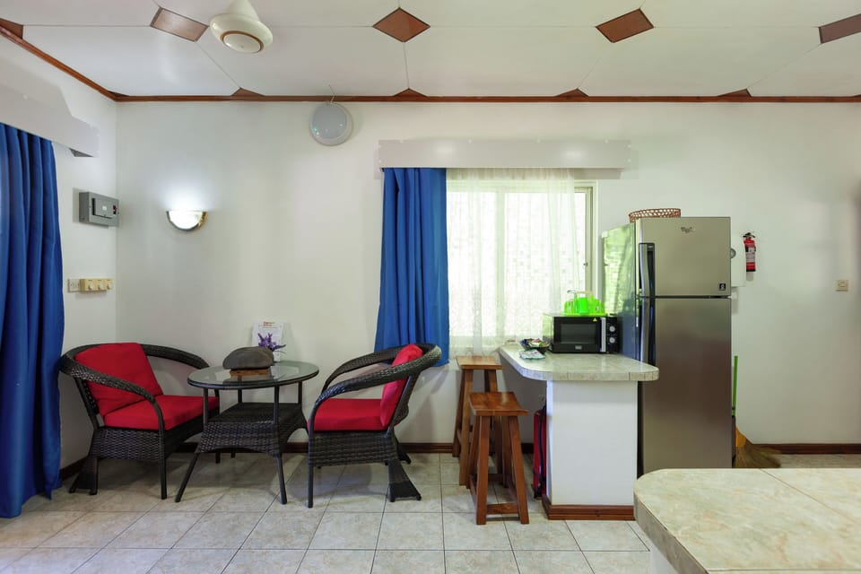 Deluxe Villa, 1 Bedroom, Sea View | Living area | 32-inch flat-screen TV with satellite channels, TV