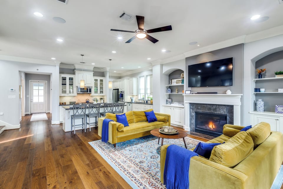 Stylish living room with 50 inch TV with easy to use gas fire place.