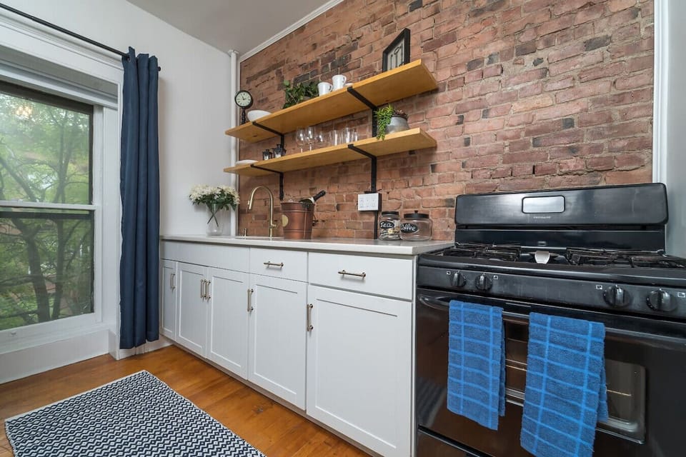 This is an original brick wall in the kitchen that was refinished.