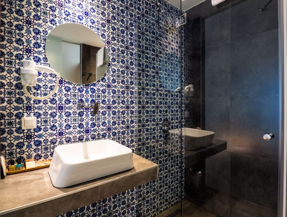 Shower, free toiletries, hair dryer, slippers