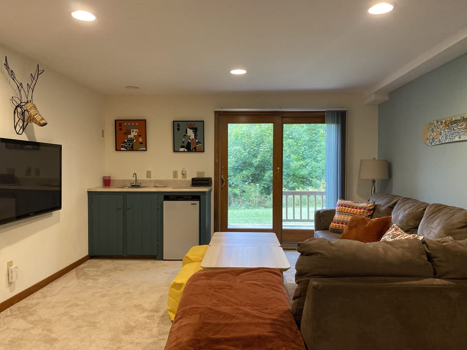 In kids lounge - bar with beverage unit, access to deck downstairs 