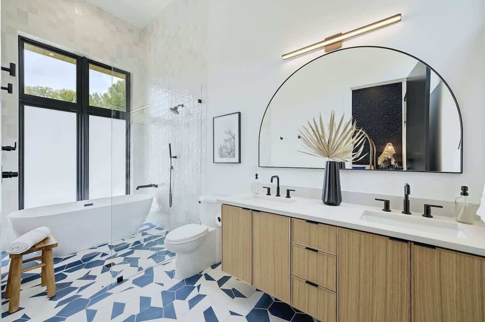 Bathroom 1- The ensuite bathroom features a walk-in shower, soaking tub and double vanities