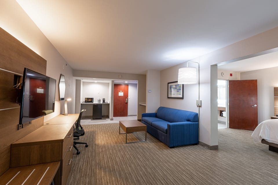 Suite, 1 King Bed | In-room safe, desk, laptop workspace, iron/ironing board
