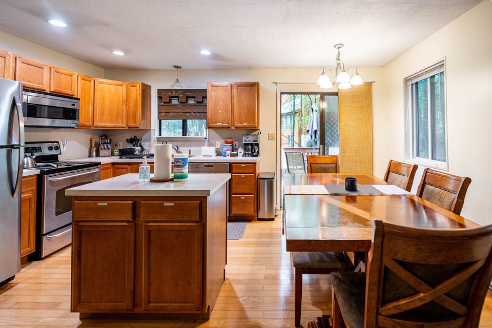 Kitchen and Dining area, leading to the outside deck.