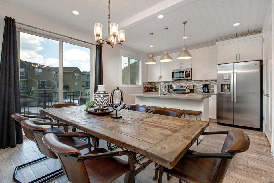 Dining Area with Seating for Eight and Balcony Access