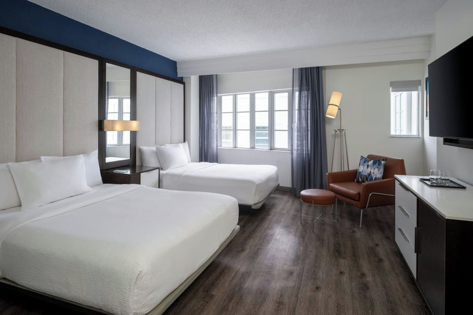 Premium bedding, down comforters, in-room safe, desk