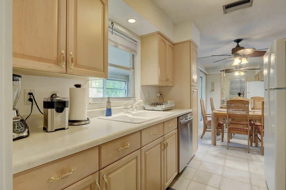Looking Towards the Dining Room From the Laundry Room and Kitchen