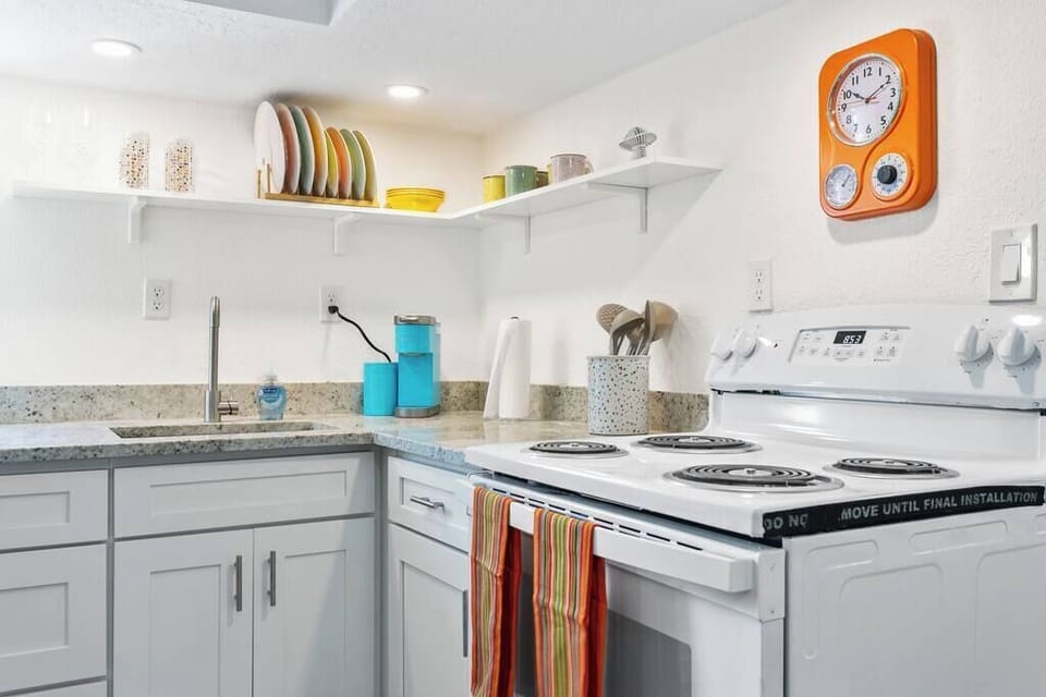Funky, fresh, and full of character, this 70s-inspired kitchen sets the scene for a memorable stay