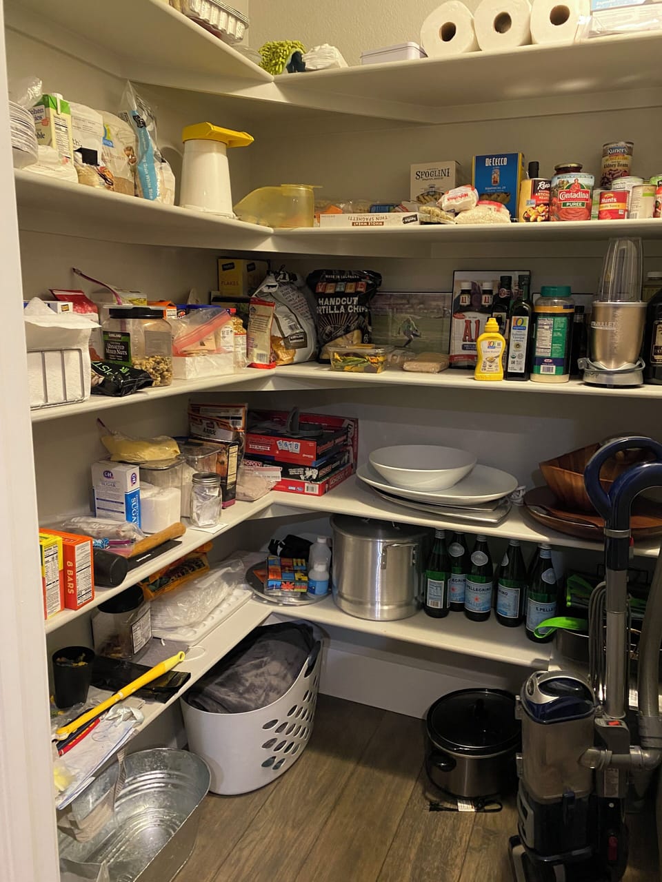 Stocked pantry with board games.