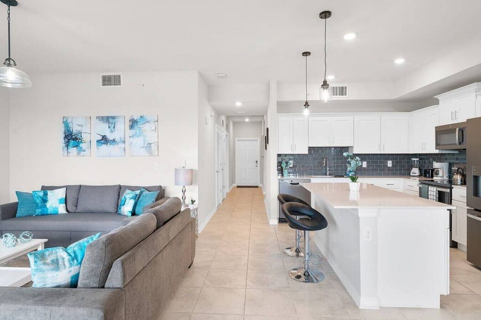Living Room & kitchen#Disney #Parks #kingdom #springs #StoreyLake #Apartment #Vacation #Rental #waterpark #Kissimmee #Orlando #universal #citywalk