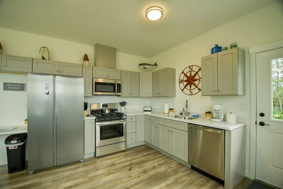 Fully Stocked Kitchen with ocean decor.