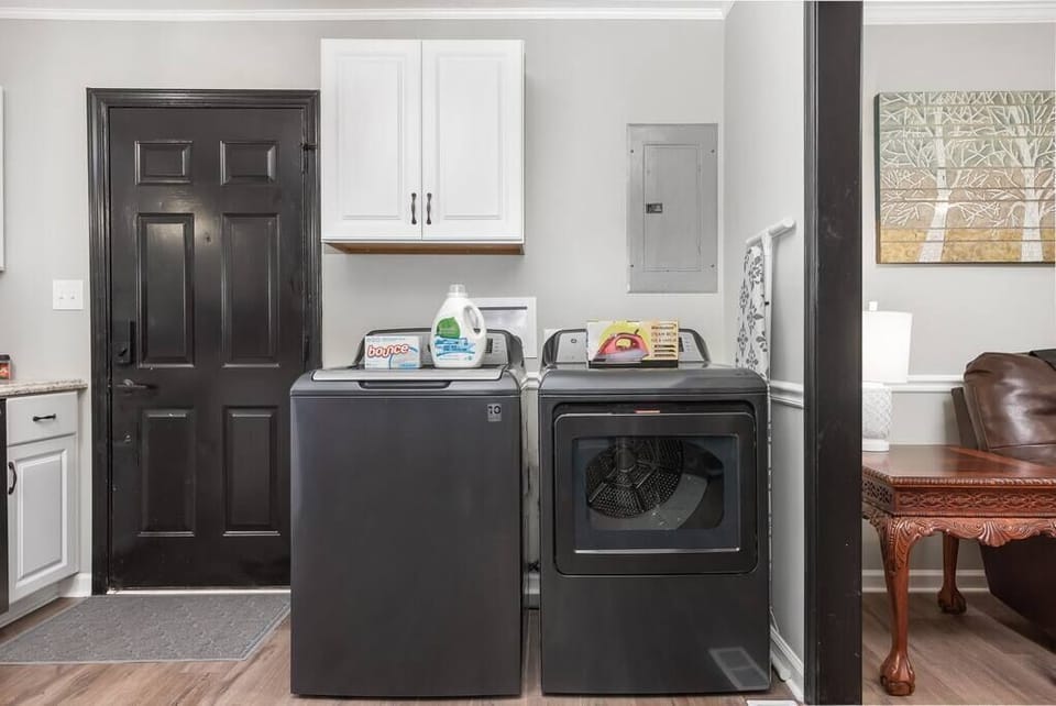 Laundry includes free washer/dryer with laundry detergent, dryer sheets, iron & ironing board. 