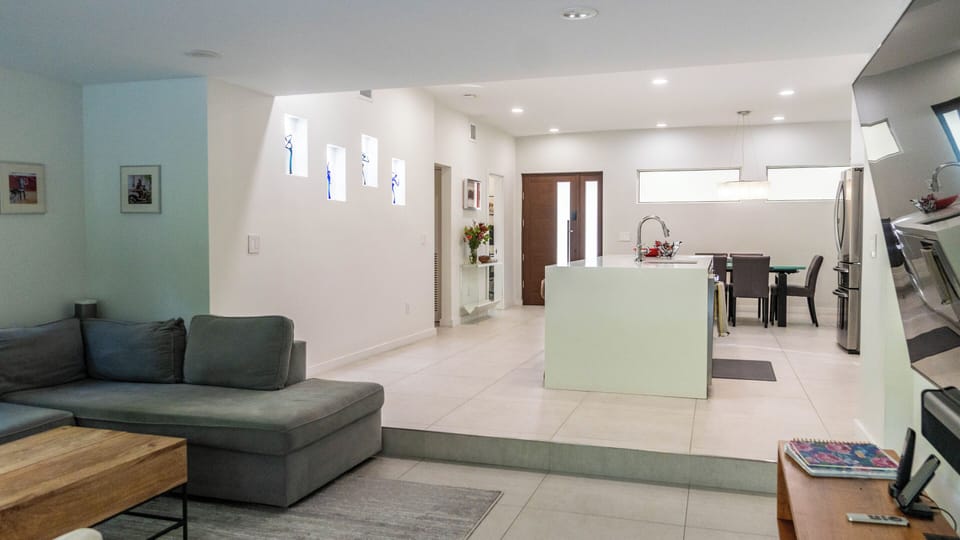 The dining room, kitchen and living room are all connected