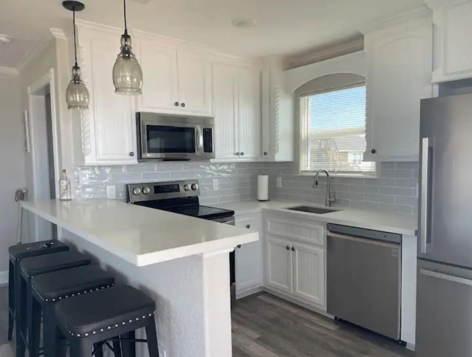 Quartz countertops. High end cabinetry and all new appliances! 