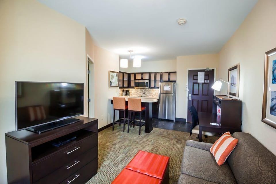 Living area with dining table and kitchenette