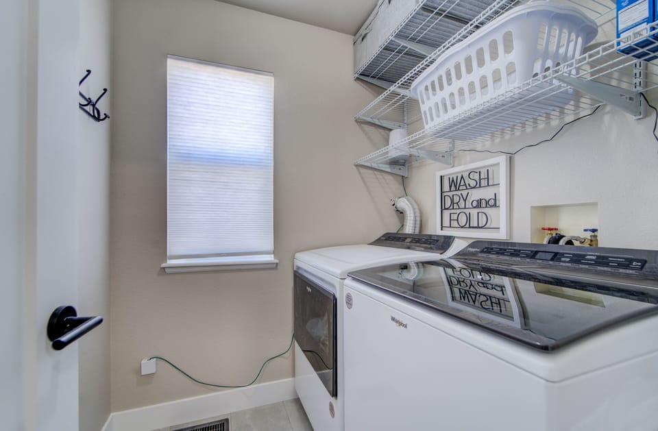 Main level Laundry room off of Mudroom and next to garage