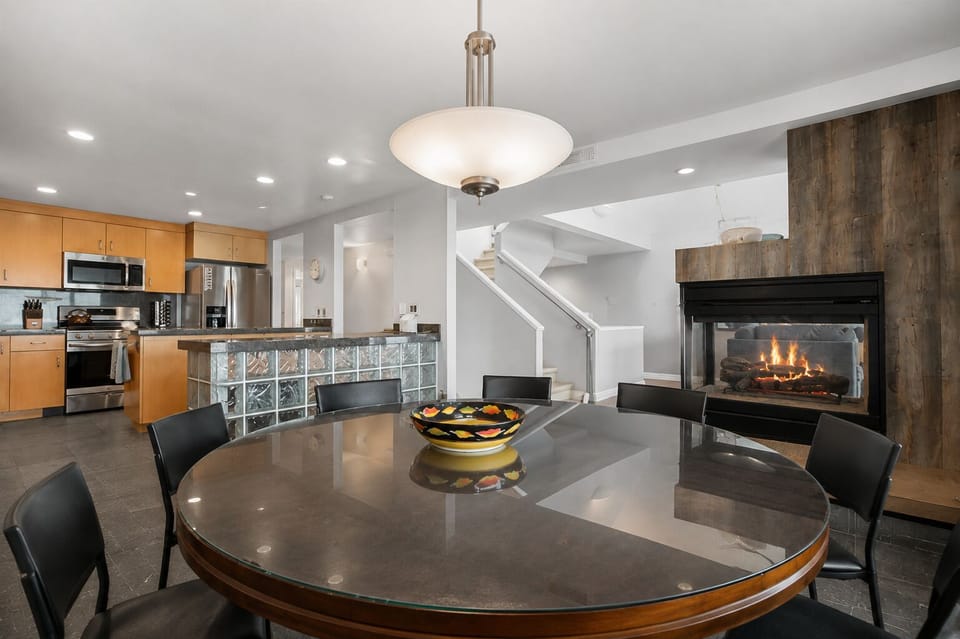 Bright and airy dining room with seating for 12, perfect for family meals or group dinners.