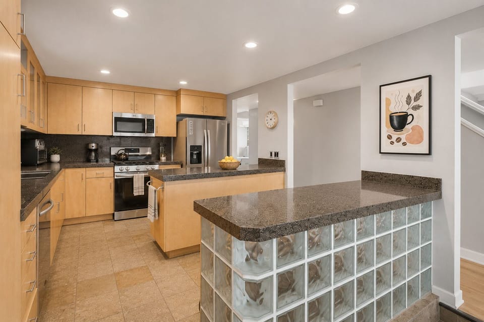 Fully equipped kitchen with modern appliances, perfect for preparing gourmet meals or casual snacks.