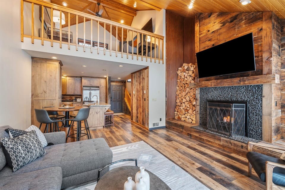 Open concept living room with golf course views.