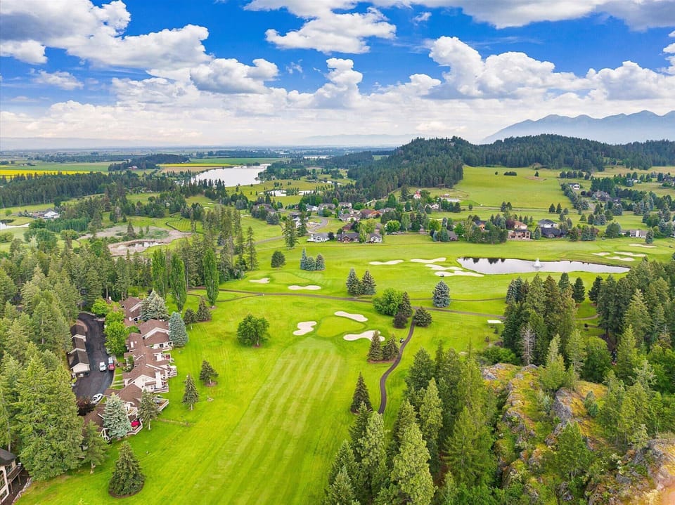 Located on Eagle Bend Golf Course, Fairway #9, next to Flathead lake.