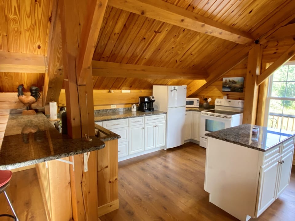 Large Kitchen with Refrigerator and Stove and Microwave
