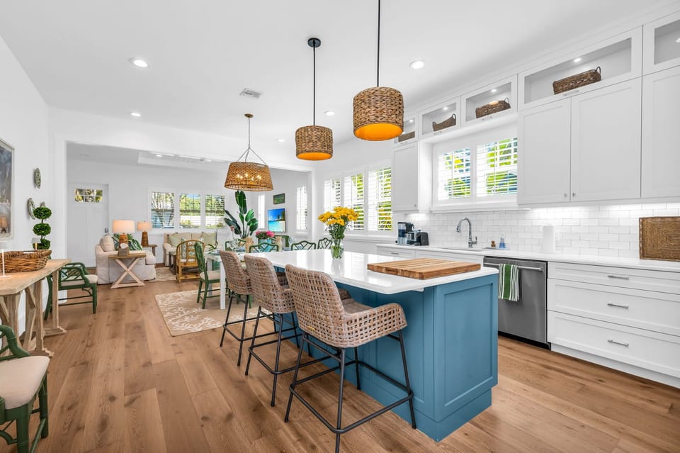 A cook's dream! The kitchen has everything you need to create that "MasterChef" meal. Enjoy the beautiful quartz top kitchen island for eating or food preparation. Dinner service for 8.