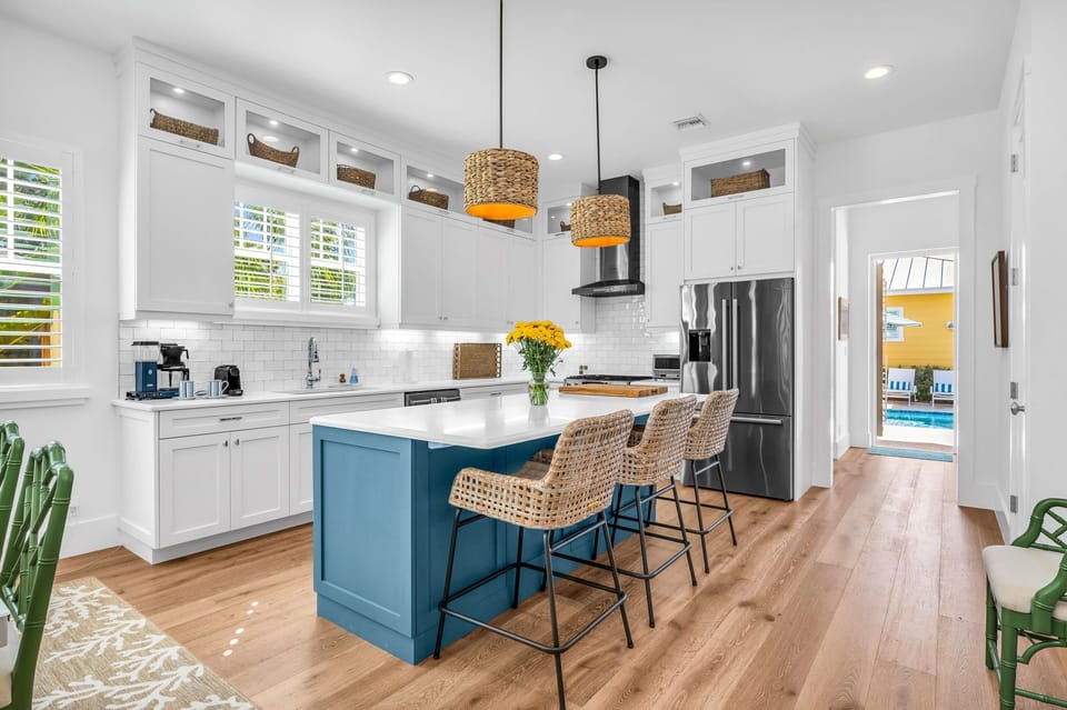 A cook's dream! The kitchen has everything you need to create that "MasterChef" meal. Enjoy the beautiful quartz top kitchen island for eating or food preparation. Dinner service for 8.