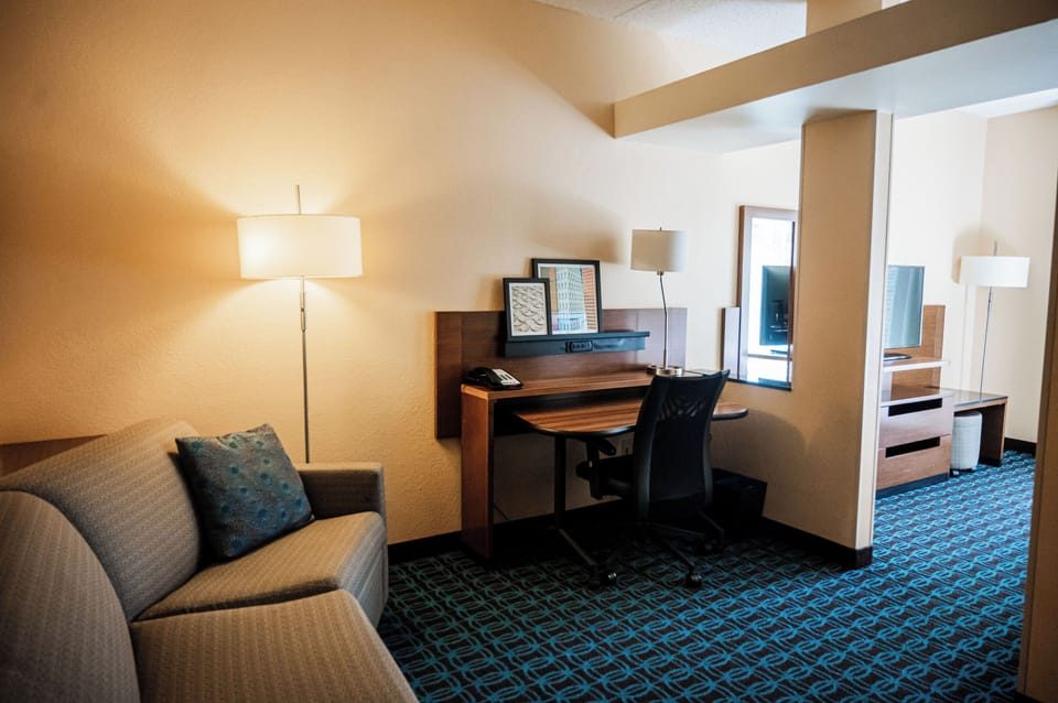Executive Suite, 2 Double Beds | Living area | TV