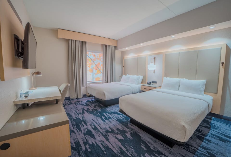Suite, Multiple Beds | In-room safe, desk, iron/ironing board, free rollaway beds