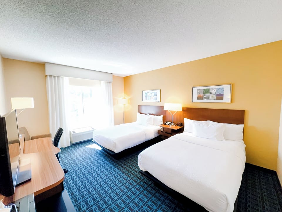 Room, 2 Double Beds | In-room safe, desk, iron/ironing board, free rollaway beds