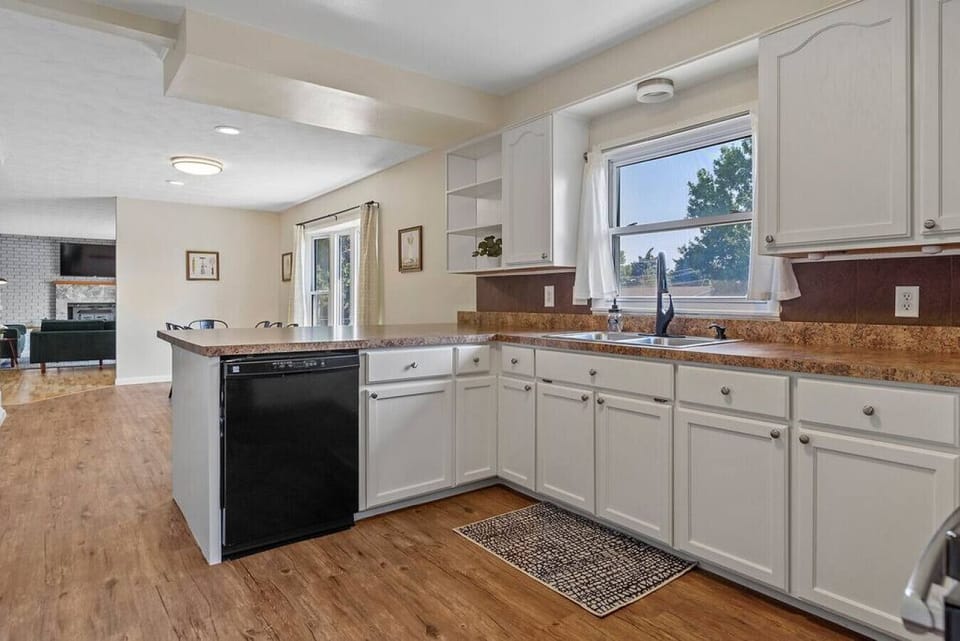 It comes with a coffee maker for your morning brew, a stove and oven for cooking and baking, and a dishwasher to make cleanup easy