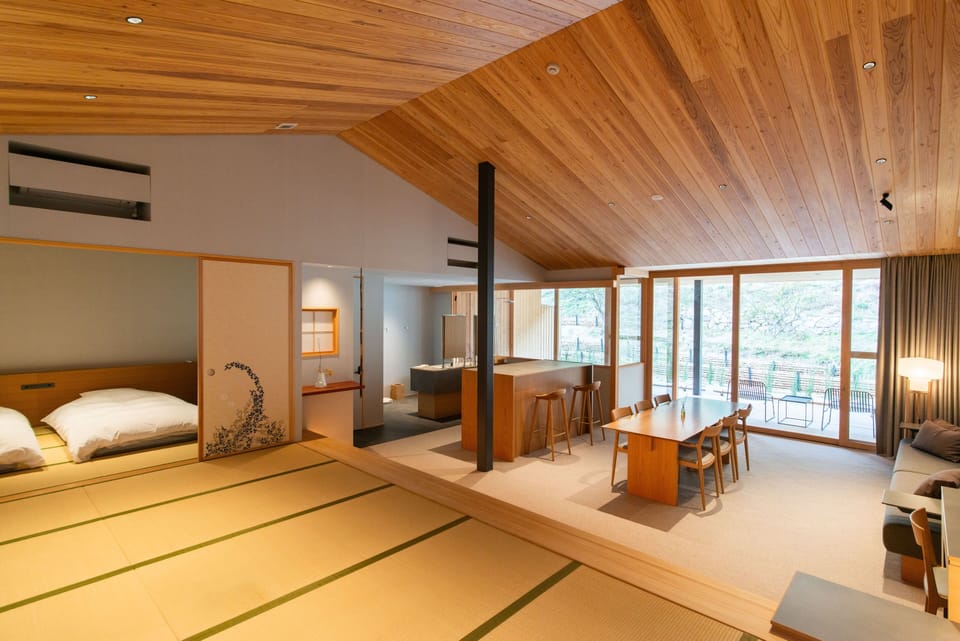 Superior Suite | Minibar (free items), in-room safe, desk, laptop workspace