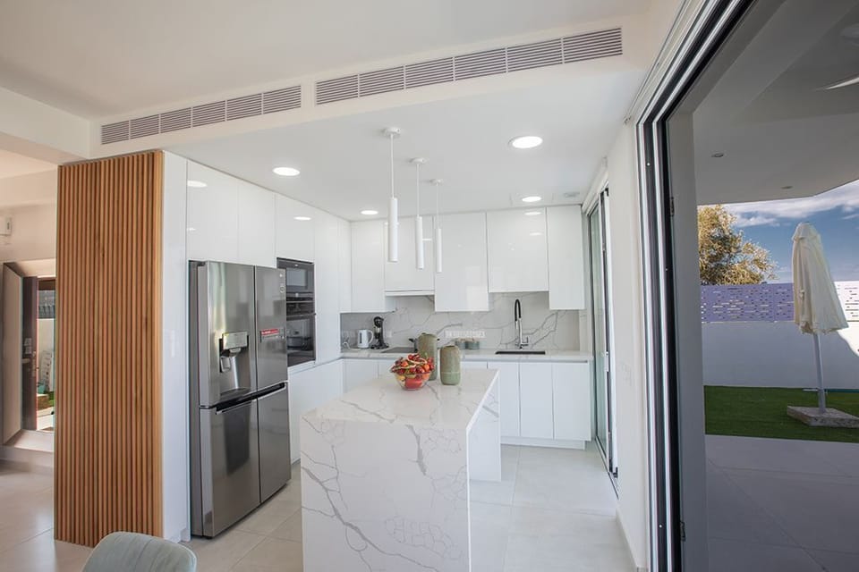 Modern kitchen fully equipped with all appliances and utensils