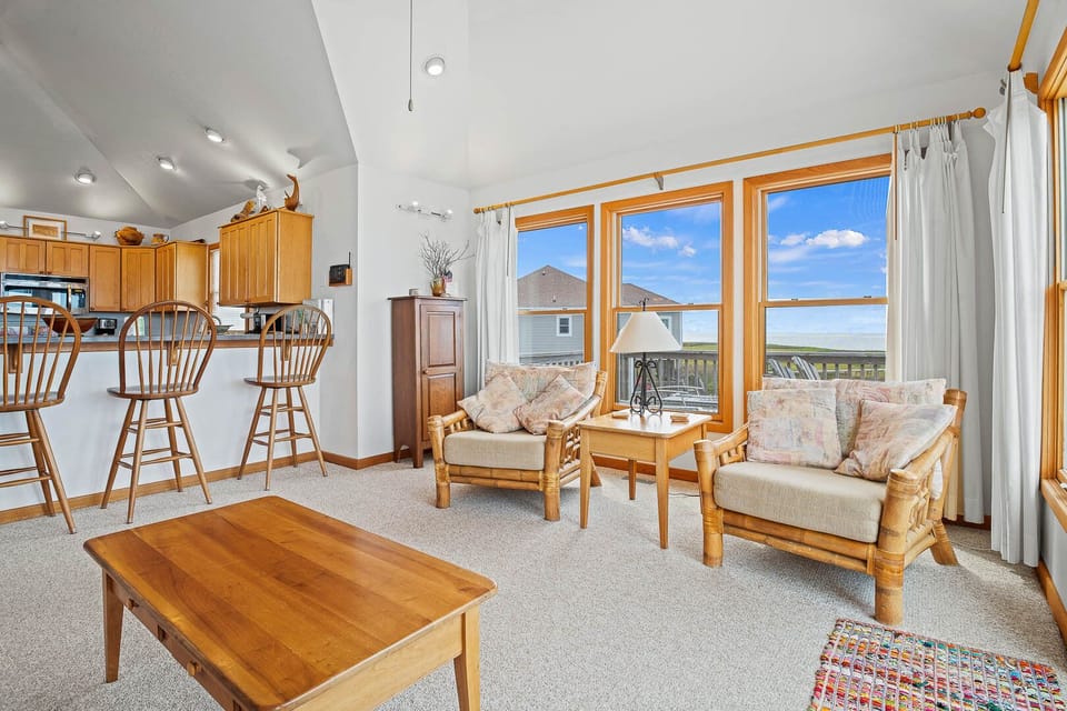 Living Room with Deck Access and Sound Views on Third Level