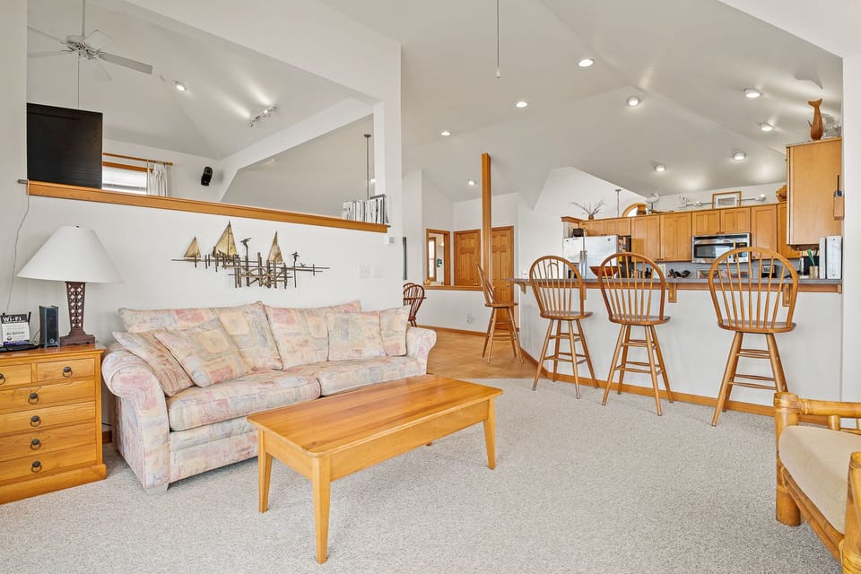 Living Room with Deck Access and Sound Views on Third Level