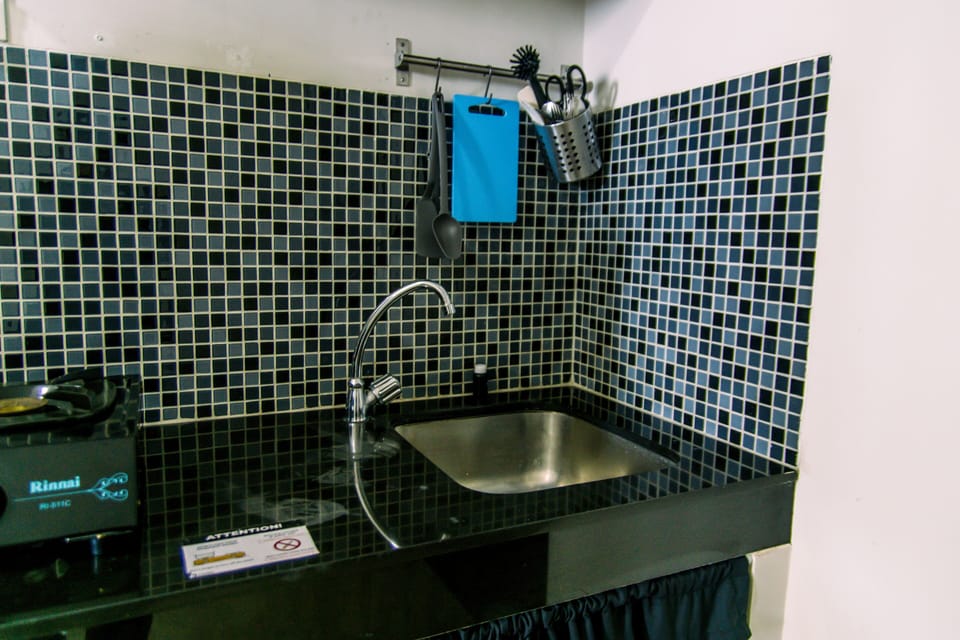 Deluxe Apartment, 2 Bedrooms | Private kitchen | Fridge, rice cooker, cookware/dishes/utensils