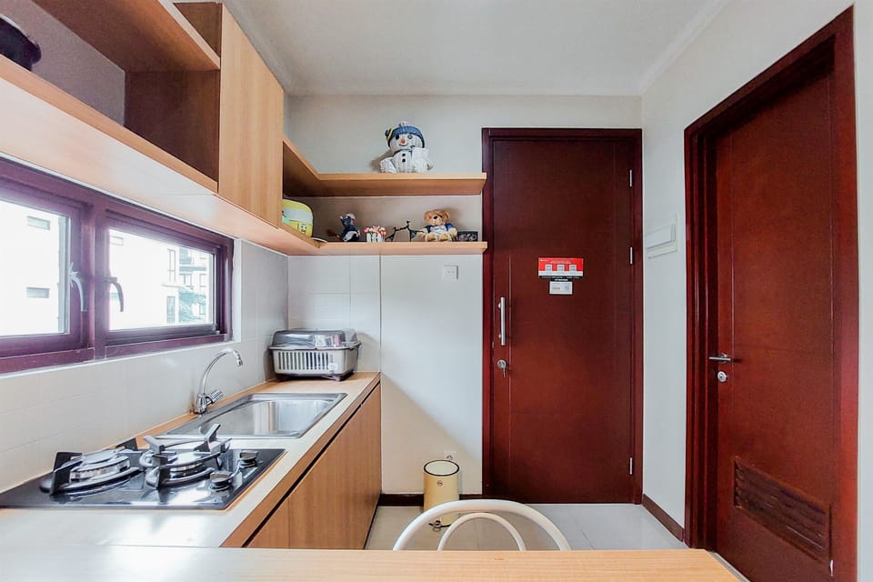Apartment, 2 Bedrooms | Private kitchen | Fridge, stovetop, cookware/dishes/utensils, dining tables