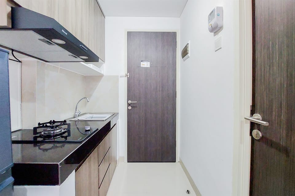 Apartment, 2 Bedrooms | Private kitchen | Fridge, stovetop, electric kettle, cookware/dishes/utensils
