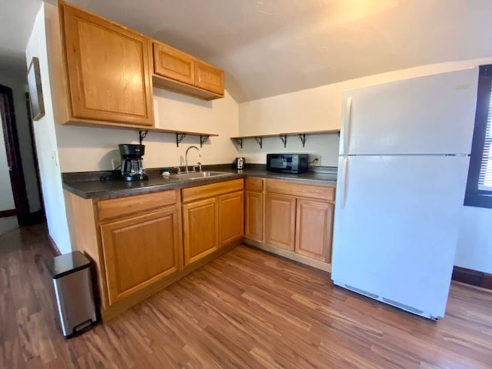 Updated kitchen area, fully furnished for your cooking needs!