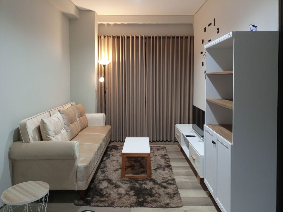 Apartment, 1 Bedroom | Living area | TV